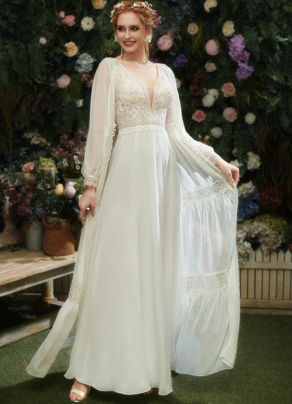 Robe De Mariée Fluide À Manches.